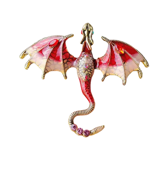 Colorful dragon-shaped earring held between fingers against a neutral background