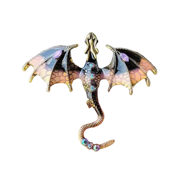 Dragon-shaped earring held between fingers against a neutral background
