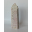 Hand-carved Albite Mica tower featuring radiant white albite with shimmering mica inclusions, displayed on a white background.