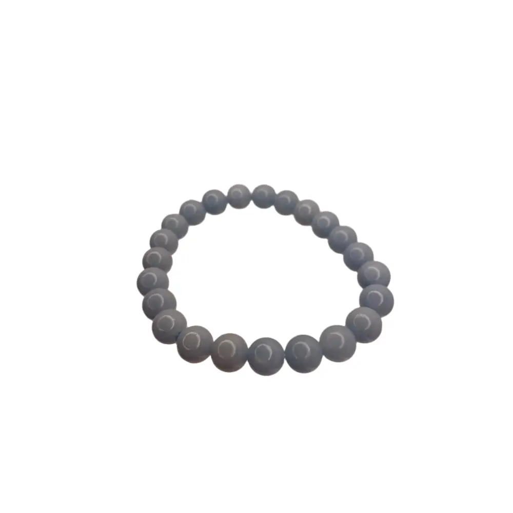 Blue beaded bracelet on a white surface