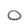 Blue beaded bracelet on a white surface