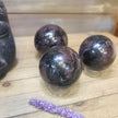 🔥✨ Arfvedsonite (Firework Stone) w/ Garnet Spheres – Ignite Transformation & Manifest Magic! ✨🔥 - Spheres