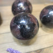 🔥✨ Arfvedsonite (Firework Stone) w/ Garnet Spheres – Ignite Transformation & Manifest Magic! ✨🔥 - Spheres