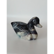 Assorted hand-carved animal figurines made from Blue Tiger’s Eye, Fluorite, and Tiger’s Eye crystals, each featuring unique colors and patterns, displayed on a white background.