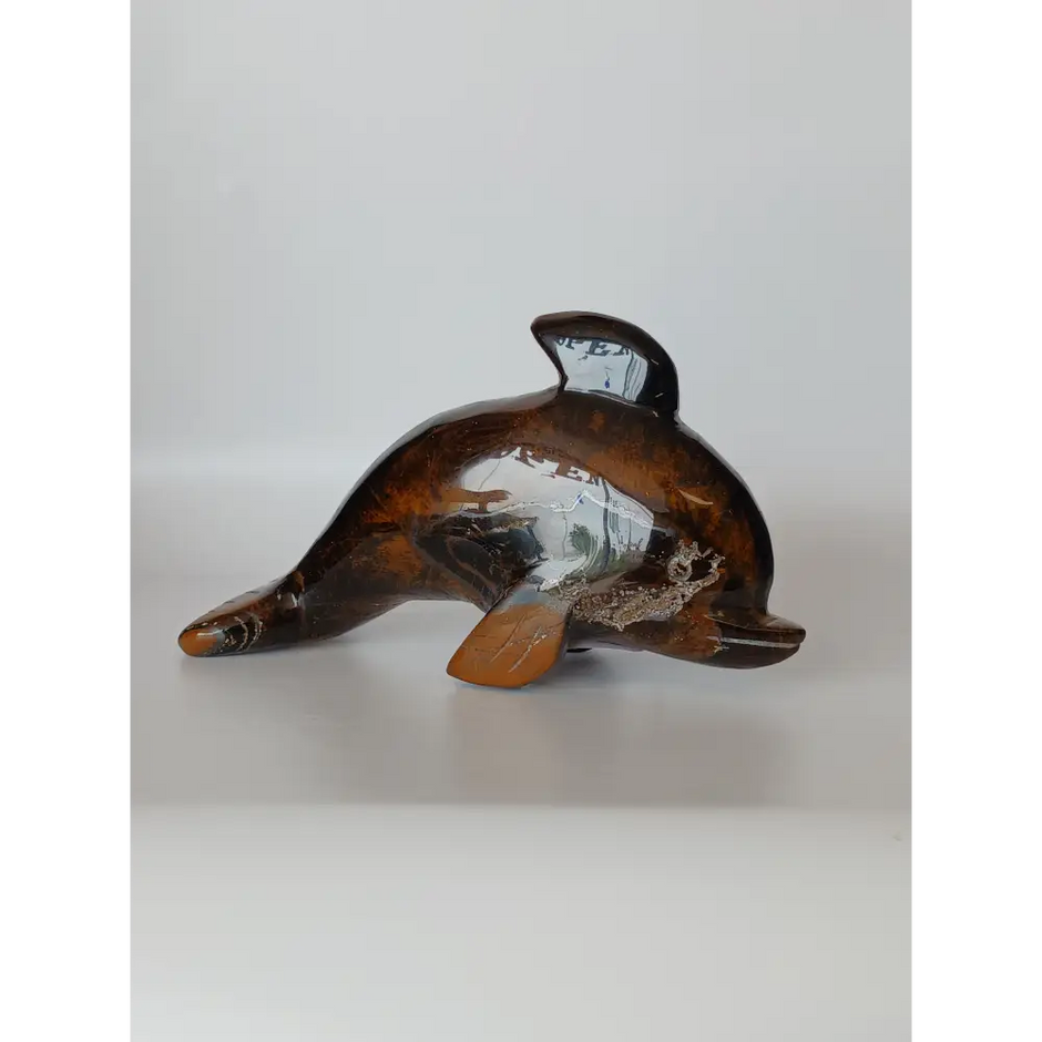 Assorted hand-carved animal figurines made from Blue Tiger’s Eye, Fluorite, and Tiger’s Eye crystals, each featuring unique colors and patterns, displayed on a white background.