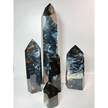 Hand-carved Blue Agate tower with soothing blue bands and natural patterns, displayed on a white background.
