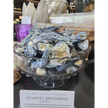 Raw blue kyanite specimen chunk with vibrant blue blades and natural texture, displayed on a white background. Perfect for chakra alignment, communication, and energetic balance.