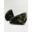 Labradorite freeform with vibrant flashes of blue, green, and gold, polished and displayed on a white background.