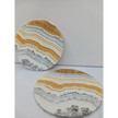Dendritic Orange Calcite charging plate, 5.5 inches, with vibrant orange hues and natural dendritic patterns, displayed on a white background.