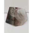 Hexagonal stone with a rough texture on a white background