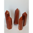 Hand-carved Goldstone tower featuring glittering copper sparkles and a glossy golden-brown finish, displayed on a white background.