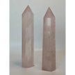 Hand-polished 5.5-inch Rose Quartz tower featuring vibrant, translucent pink hues, displayed on a white background.