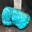 Malachite and chrysocolla specimen with vibrant green bands and blue-teal hues, displayed on a white background. Perfect for transformation, heart healing, and inner wisdom.
