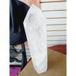 Diamantina clear quartz tower, 17 inches tall, polished with exceptional clarity and natural inclusions, displayed on a white background.