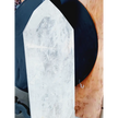 Diamantina clear quartz tower, 17 inches tall, polished with exceptional clarity and natural inclusions, displayed on a white background.