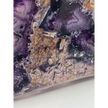 Rainbow fluorite bowl, 7.5 inches, with vibrant bands of color and a garden-like pattern on the back, displayed on a white background.