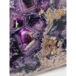 Rainbow fluorite bowl, 7.5 inches, with vibrant bands of color and a garden-like pattern on the back, displayed on a white background.
