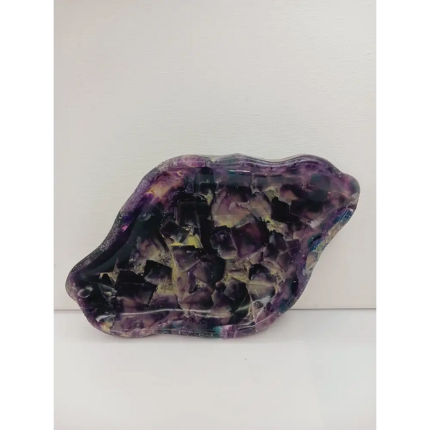Rainbow fluorite bowl, 7.5 inches, with vibrant bands of color and a garden-like pattern on the back, displayed on a white background.