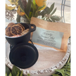 Serenity Simmer Pot Blend with dried lemon slices, eucalyptus leaves, and pink Himalayan salt, arranged on a white background. Perfect for creating a fresh and calming home aroma.