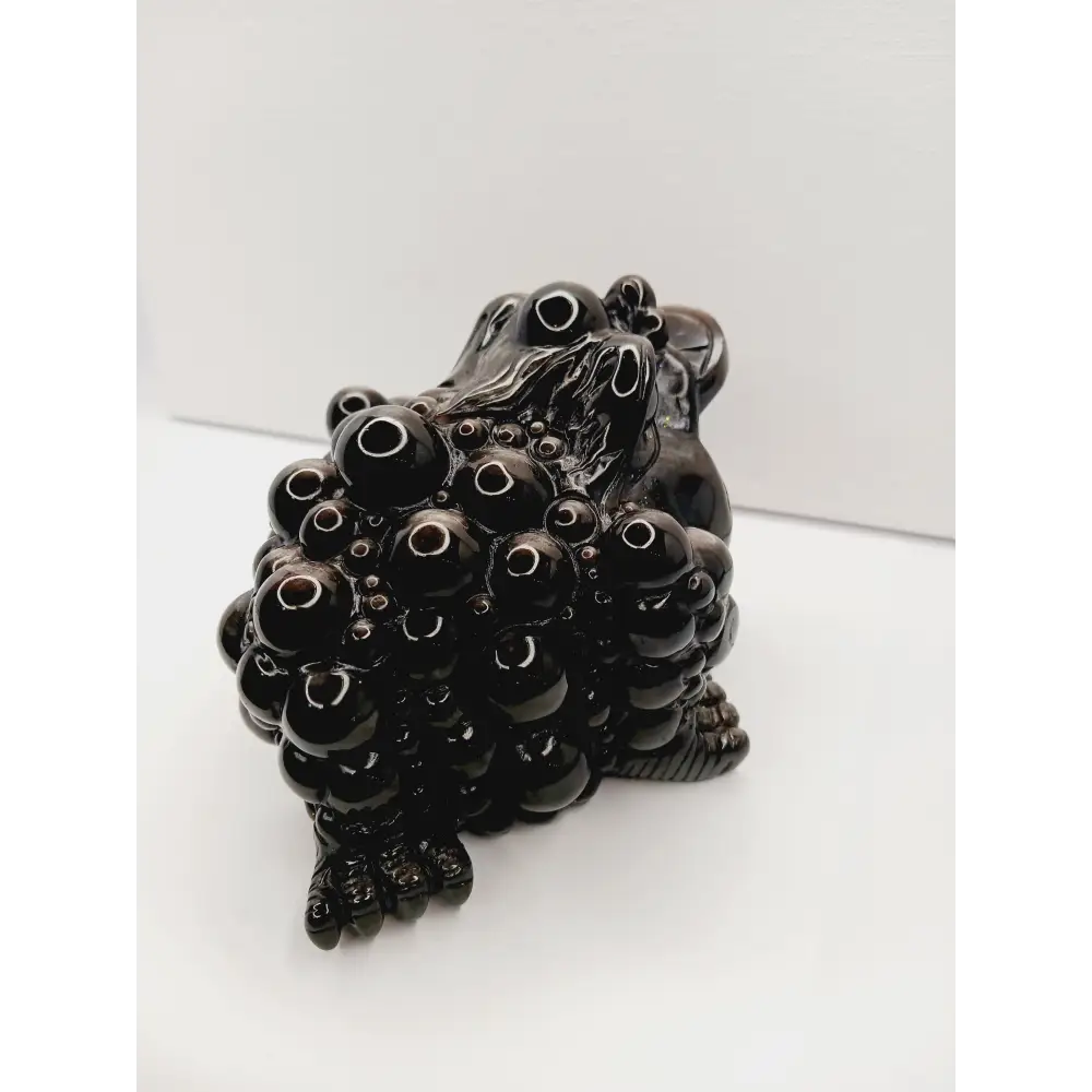 Silver sheen obsidian money toad, hand-carved with a reflective silver luster, measuring 5.5 inches, displayed on a white background.