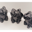 Toothless dragon carving, 3.5 inches, hand-carved from glossy black obsidian, displayed on a white background.