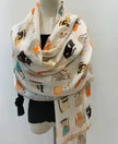 Scarf with cat pattern on a mannequin against a white background